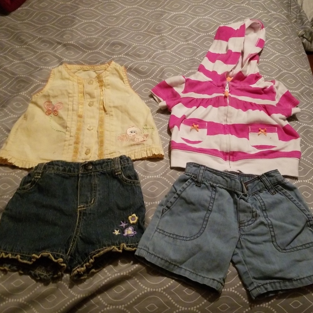 2 sets with shirts and shorts